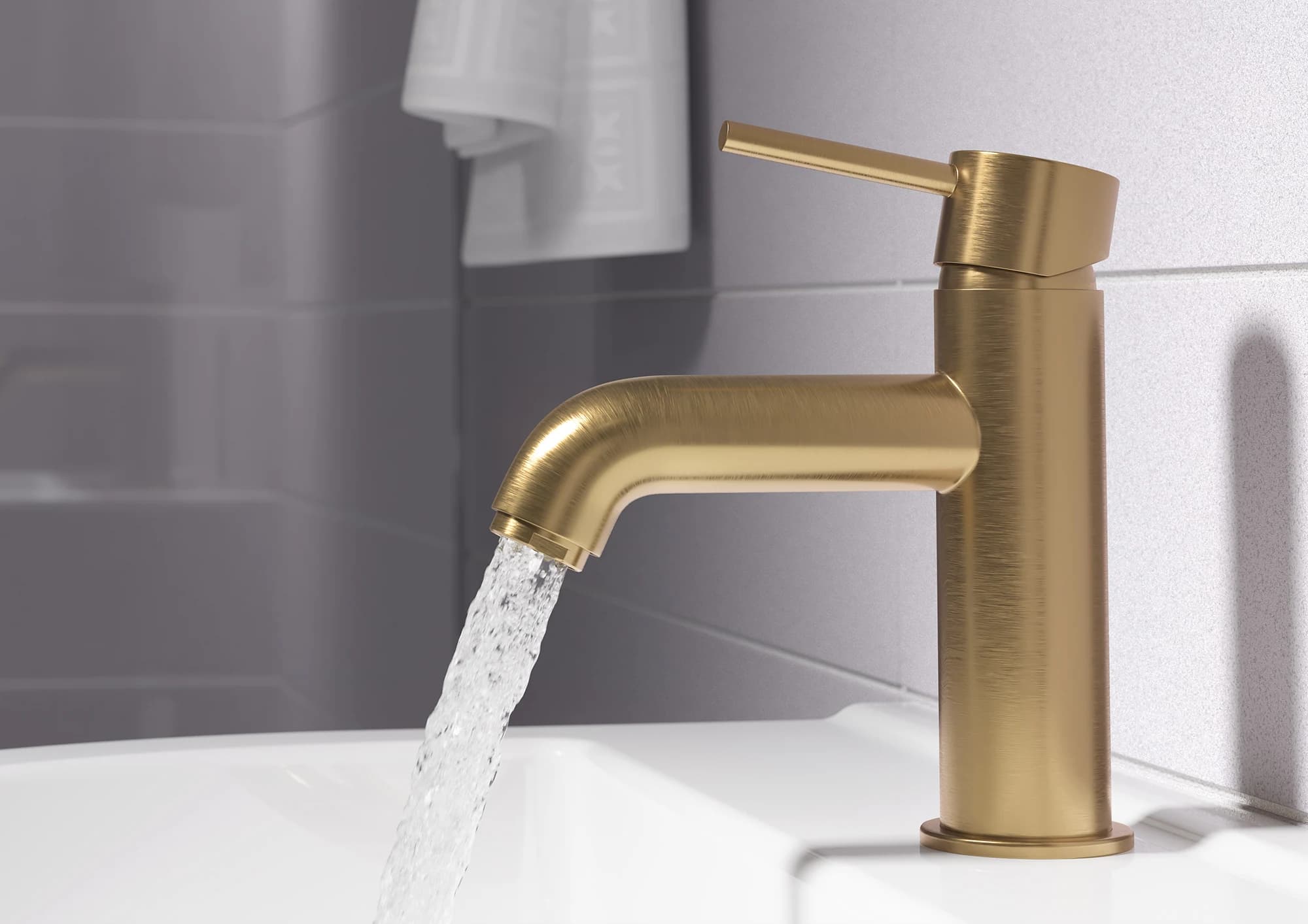 Brushed brass basin mixer product CGI in a bathroom setting