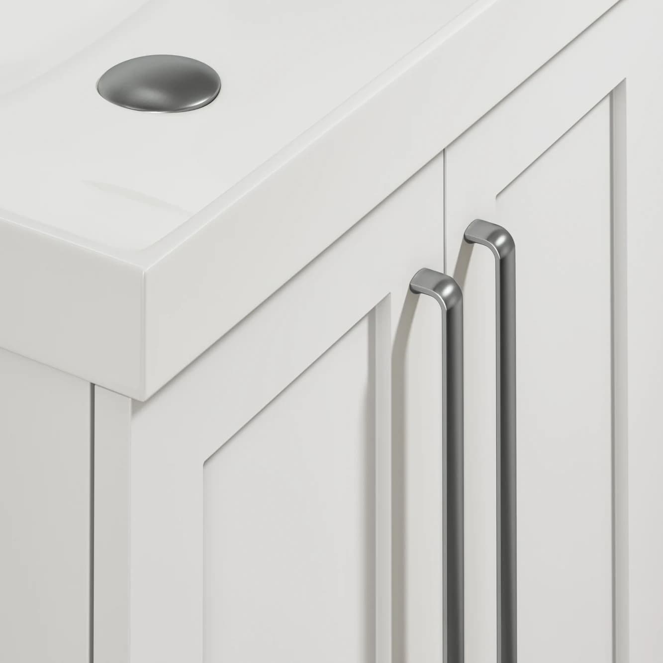 Close-up bathroom furniture CGI showing brushed pewter handle detail